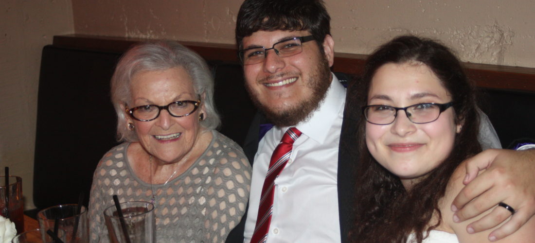 Harris with his wife and grandmother at his wedding.